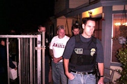 Ronald 'Slow' Slocum is taken into custody by a federal anti-gang task force. He was indicted under the RICO statute.