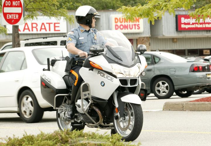 BMW offers two police motorcycles: the R1200 RT-P (pictured) and G650. The RT-P, which is favored by the CHP and Los Angeles County Sheriff's Department, is the police version of a civilian model that offers an 1170 cc boxer twin motor rated at 110 hp. The bike uses two batteries: one to start and an auxiliary to run the lights, onboard computer and other gear. There are analog and digital speedometers; the later allows the officer to pace a vehicle, monitor its speed and store that information in the onboard computer. The bike arrives with mounts for a shotgun, baton, radio and laser gun. Photo via BMW Motor Co.