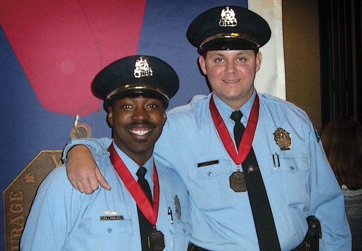 St. Louis PD Officers Duane Hollinshed (left) and Matthew Simpson received the Medal of Valor for their actions.