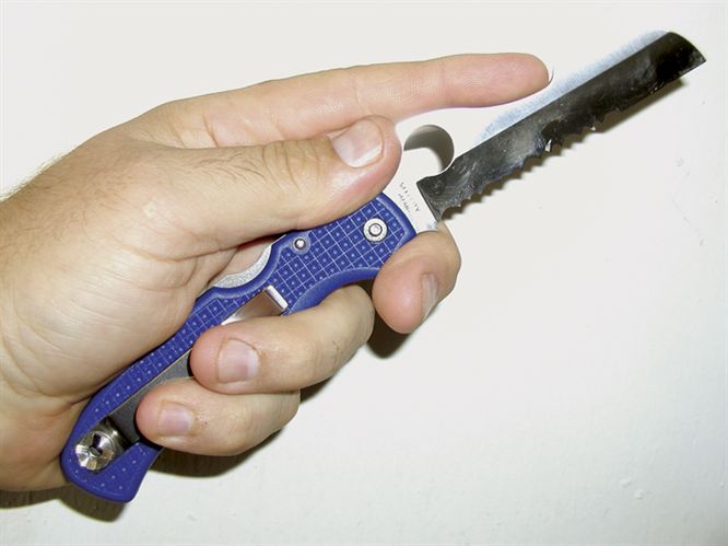 The Spyderco Rescue 93mm features a serrated blade for cutting webbing.
