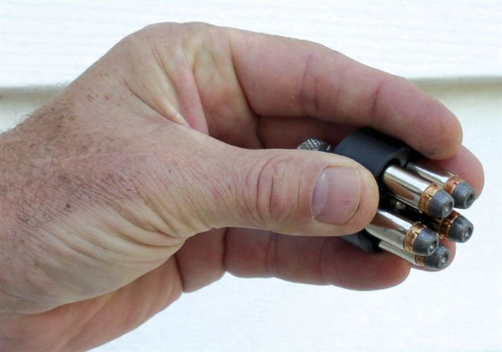 The author demonstrates the right grip for speed loader use.