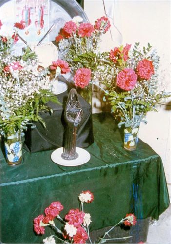 Photo of 1997 infant murder scene in Santa Ana, Calif. The crime scene was a converted garage in which the 'high priest' conducted occult rituals to a mixture of Afro-Caribbean and Mexican 'saints' and deities. The picture depicts one of the main altars with the Mexican drug cartel saint 'Santa Muerte' (Holy Angel of Death).