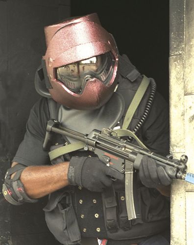 An officer dressed for a marking round exercise.