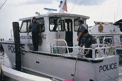 Nassau County police officers prepare to cast off aboard their newest patrol boat.