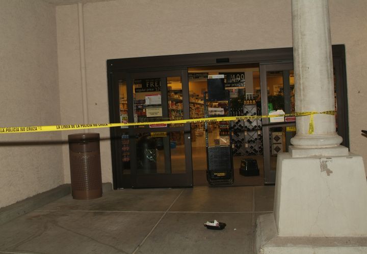 After a near-shootout at a gas station and vehicle pursuit, the suspect stormed into a grocery store and held a hostage at gunpoint.