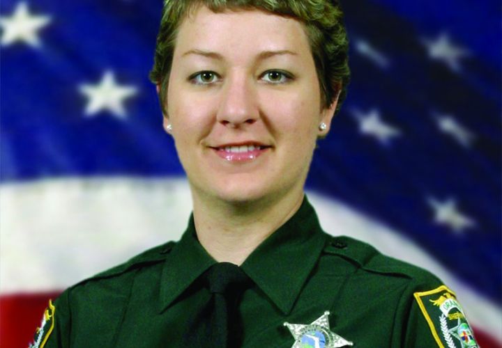 Orange County (Fla.) Sheriff's Dep. Jennifer Fulford came to the aid of two children inside a vehicle in a garage between her and two armed home invaders.