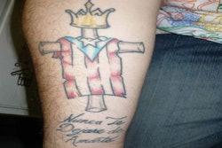 An example of a Latin Kings tattoo. The phrase, 'Nunca te dejare de amarte' means, 'I will never stop loving you.' Photo: DOJ.