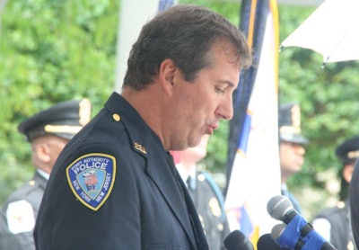 A Port Authority Police officer speaks at a rainy Sept. 9 ceremony in D.C. for the fallen 9/11 police responders. The ceremony was hosted by the National Law Enforcement Officers Memorial Fund. Photo: NLEOMF.