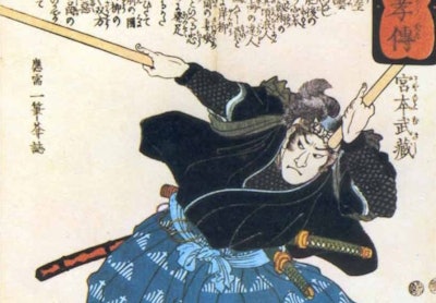 Musashi Miyamoto with two Bokken (wooden quarterstaves) depicted on an ancient Japanese scroll.