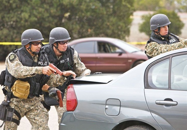 Swat team running up cheap stairs