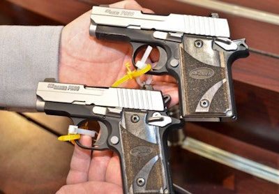 SIG Sauer's P938 (above) and P238 pistols. Photo: Mark W. Clark.