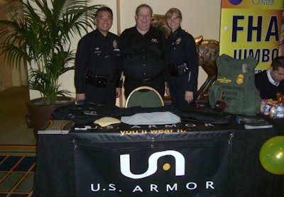 From left to right, Deputy Chief Terry Hara; U.S. Armor's Georg Olsen; and Assistant Chief Sandy Jo MacArthur. Photo: U.S. Armor