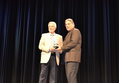 NYPD fleet manager Robert Martinez (right) recieves an industry award. Photo: Lauren Fletcher