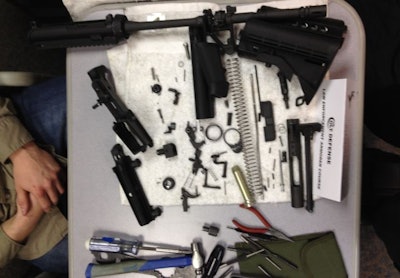 Tools needed to disassemble an AR-tyle rifle are provided at Colt's law enforcement armorer's course. Photo: Dean Caputo