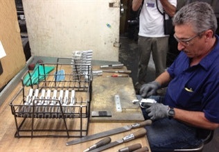 A Colt worker puts the finishing touches on a semi-auto pistol. Photo: A.J. George