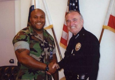 Dorner with former LAPD Chief William Bratton. Photo via Facebook.