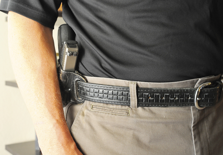 Belt buckle clearance holster