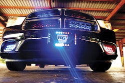 Adamson Industries' HG2 Crossfire is an outward-facing tag bezel with an emergency lighting system designed for maximum visibility. The Crossfire lighting design features optics mounted at grazing angles to enhance visibility by emitting light onto a broader field of view. There are multiple color combinations and flash patterns available. Constructed of aluminum with a black powder coat finish for durability, it utilizes factory mounting locations for ease of installation and its design can fit to all vehicles.