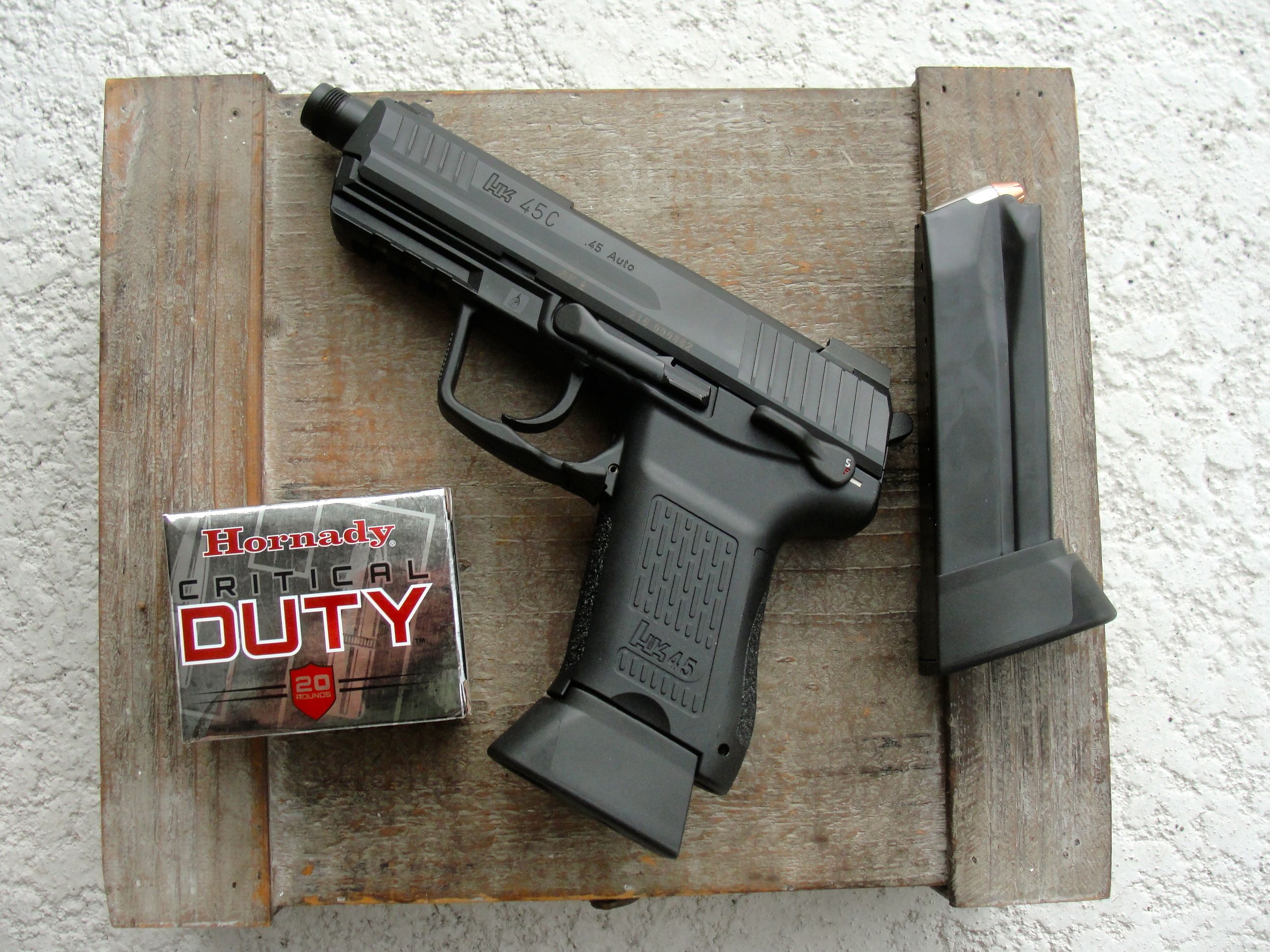 The HK45CT is a compact, polymer-framed combat pistol with a Picatinny rail for accessories and a threaded barrel for suppressors.