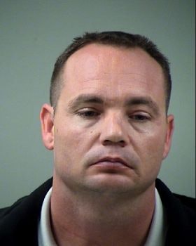 Booking photo of Officer Jackie Len Neal. Photo: Bexar County (Texas) Sheriff's Department