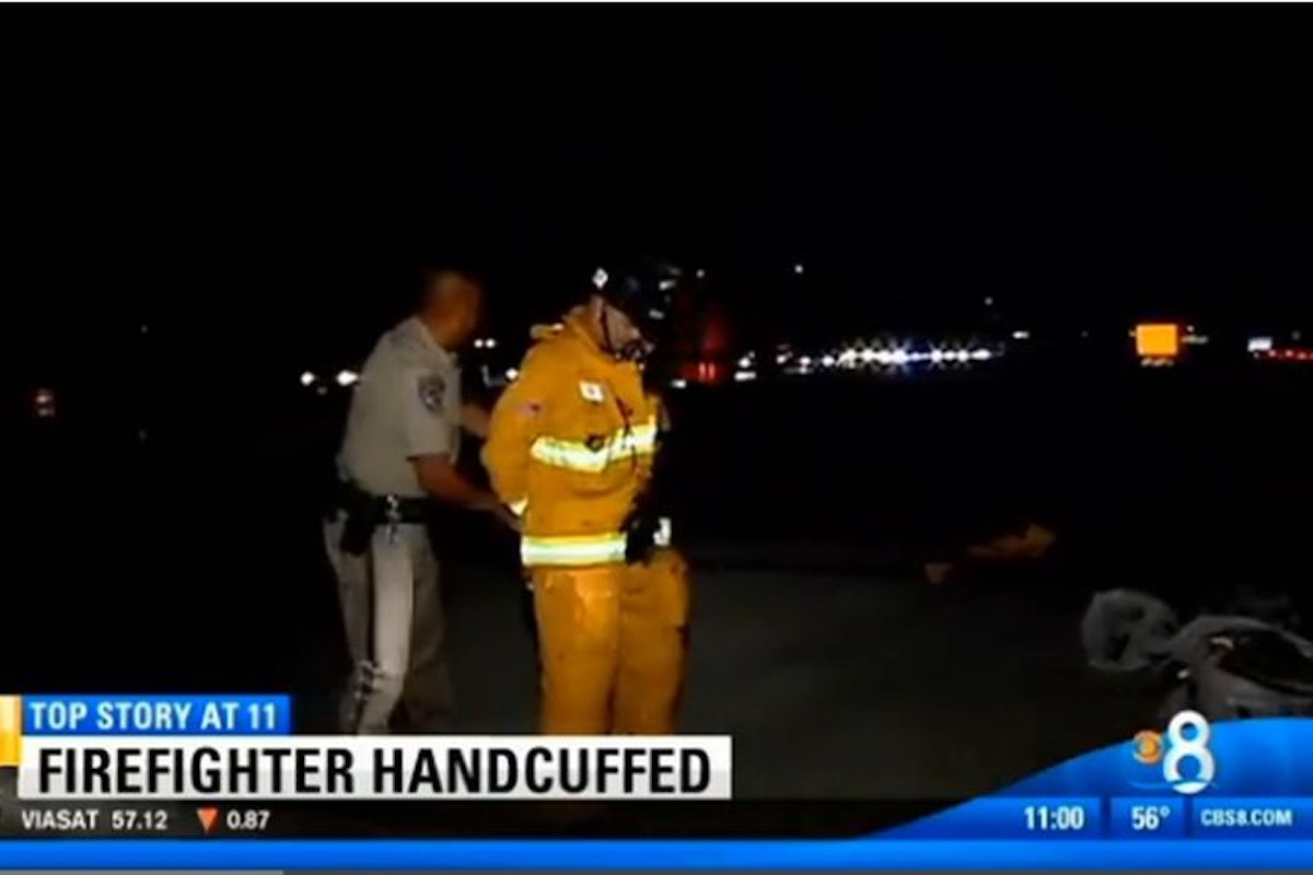 CHP Officer Handcuffs Firefighter at Crash Scene Police Magazine