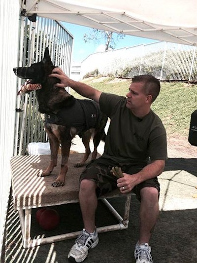 Bruno and his handler Officer R.J. Young before the shooting (Photo: Facebook)