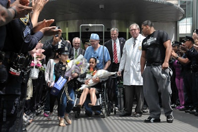 NYPD Officer Rosa Rodriguez with family and supporters as she is released from the hospital. (Photo: Facebook)