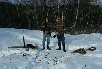 Cover photo of suspected Canadian cop killer Justin Bourque's Facebook page. Bourque is on the left.