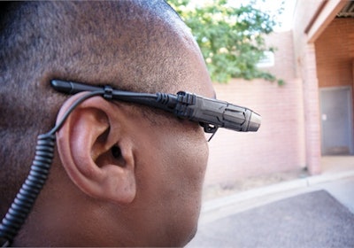 Officer demonstrates TASER Axon Flex system. (Photo: Mark W. Clark)