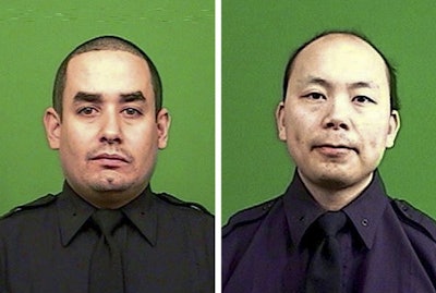 Rafael Ramos, left, and Wenjian Liu were killed while sitting in their patrol car in the Brooklyn on Dec. 20. The shooter reportedly walked up to the passenger side of the car and shot both officers in the head before they had a chance to draw their weapons and respond. He was later reportedly found dead of a self-inflicted gunshot wound in a subway. (Photo: NYPD)