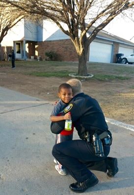 A little boy approched Officer Krieg Cook and asked for a hug. He got it. (Photo: Facebook)