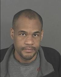 Booker, 42, is being held on suspicion of first-degree assault, vehicular assault, forgery and attempt to influence a public servant. (Photo: Denver PD)