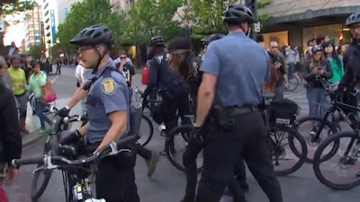 Seattle officer work a previous May Day protest. (Photo: KING 5 TV)