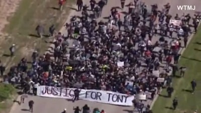 Protesters march in Madison, Wis., on Wednesday. (Photo: Screen Shot from WTMJ TV)