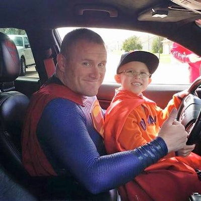 Dallas officer Damon Cole drove 11 hours to play Superman for 7-year-old Bryce Schottel. (Photo: Damon Cole)