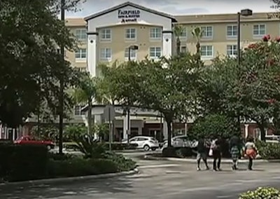 The officer was carjacked in the parking lot of the Fairfield Inn on Universal Drive. (Photo: YouTube)