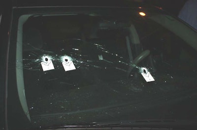 Bullet holes in windshield of unmarked car. (Photo: Jefferson Parish SO)