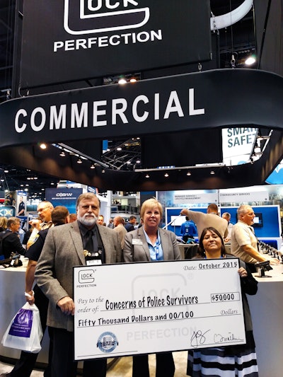 Bob Radecki, Glock national sales manager, Dianne Bernhard, C.O.P.S. executive director, and Cheryl Schultz. (Photo: Fred Mastison)