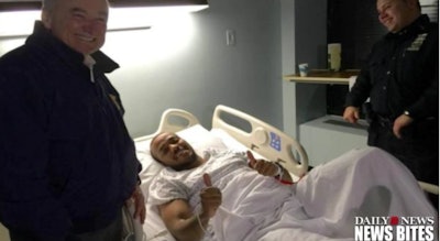 Wounded NYPD Officer Sherrod Stuart is visited in the hospital by Commissioner Bill Bratton. (Photo: screen shot from New York Daily News video)