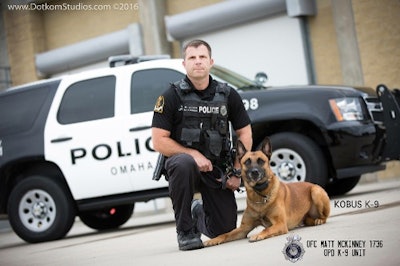Omaha K-9 Kobus with his handler, Officer Matthew McKinney. Kobus was killed in a standoff Saturday. (Photo: Omaha PD)