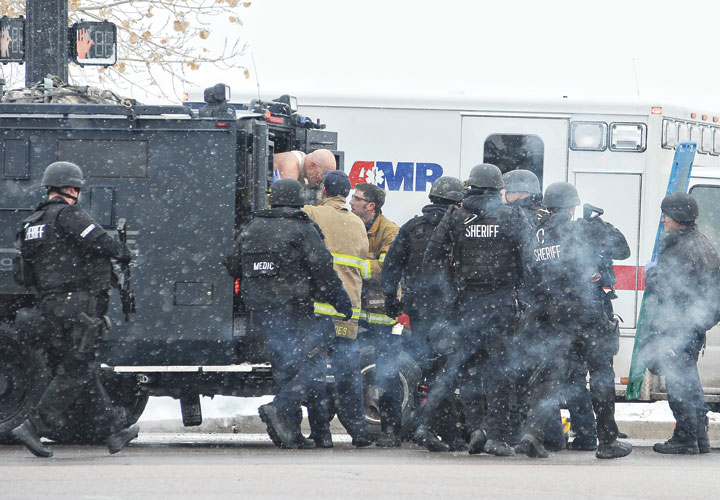 In Colorado Springs officers used armored rescue vehicles to remove wounded from the Planned Parenthood Building and ferry them to waiting ambulances. (Photo: Zuma Press)