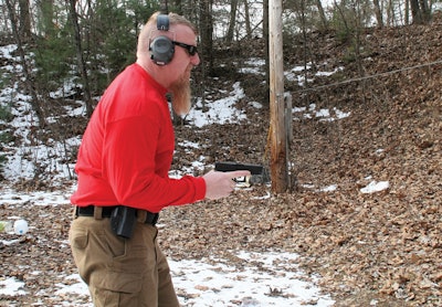 Draw your handgun while raising your elbow up. Once the gun has cleared the holster, drop your elbow straight down into your side, pointing the gun straight ahead at the intended target. Keep your gun and forearm parallel to the ground (Photo: Michael T. Rayburn)