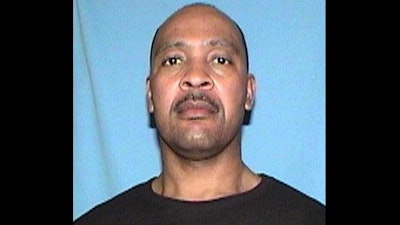 Two FBI officers were shot serving a warrant on Melvin Toran Tuesday. Toran (pictured) is a reputed leader of the Black P Stone Nation gang. He was found dead at the scene. (Photo: Illinois Department of Corrections)