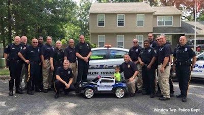 Winslow Township (NJ) Police gave the boy who bought them lunch a special toy patrol car. (PhotoL Facebook)
