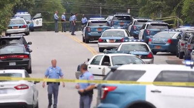 Raleigh officers shut down a street where an officer-involved shooting occurred Monday morning. (Photo: Screenshot from News & Observer raw video)