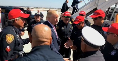 San Antonio officers who wore Trump hats while speaking with the candidate at the airport Tuesday face discipline. (Photo: Screen shot from Trump Twitter video.