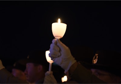 Candles burning for fallen officers during National Police Week. (Photo: Police Magazine/Lynn Cronquist)