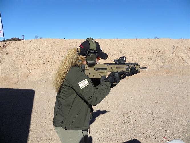 An IWI representative demonstrates the Tavor 95.