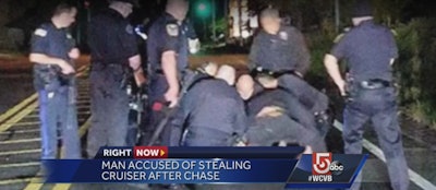 Massachusetts officers arrest a suspect who reportedly stole a patrol vehicle and led them on a pursuit. (Photo: WCVB Screen Shot)