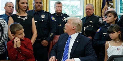 The family of slain Phoenix police officer David Glasser met with President Trump in the Oval Office Monday. (Photo: Phoenix PD/Twitter)